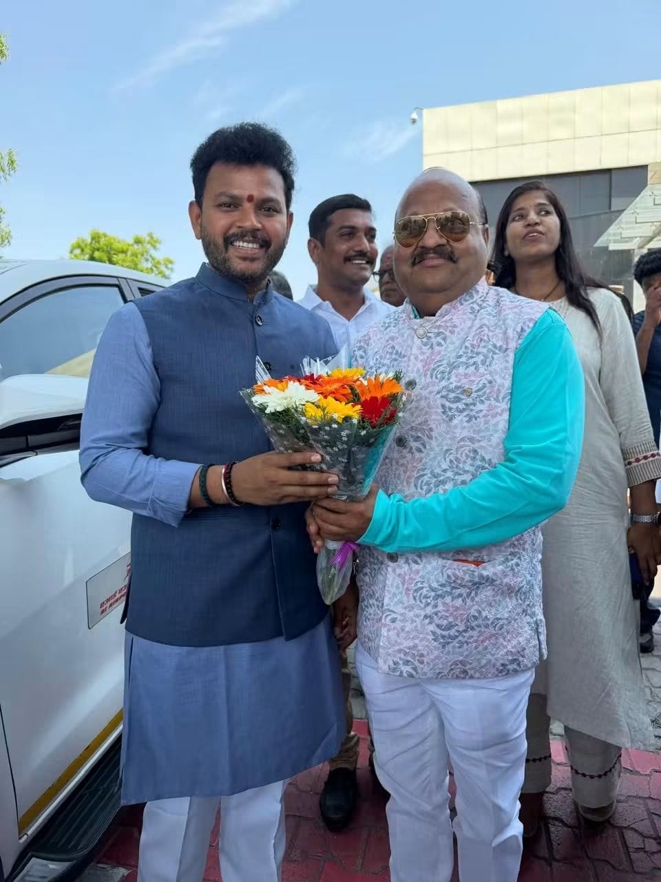 Pyarelal Gundecha felicitating distinguished official — Yash Veera Films production house