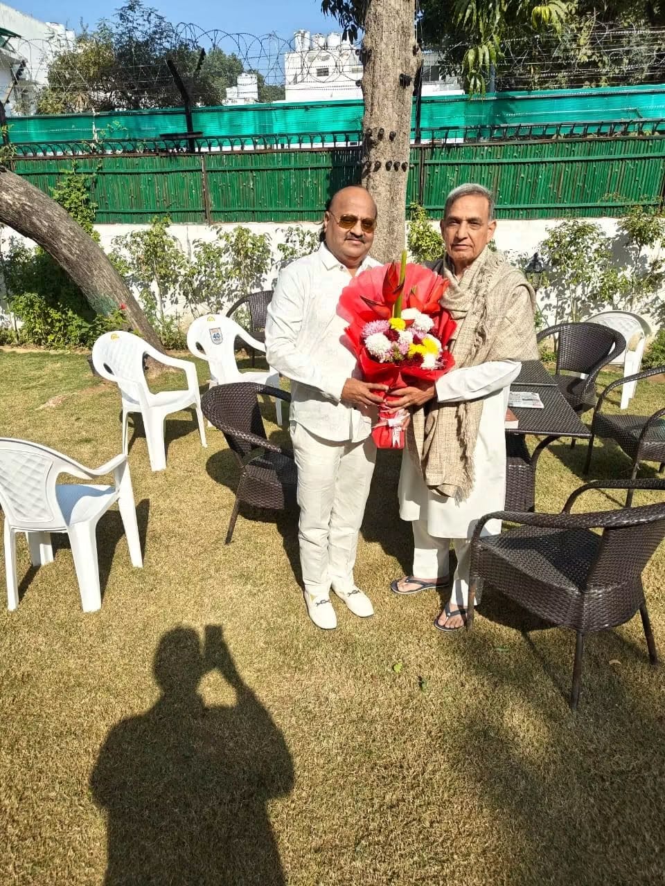 Pyarelal Gundecha with honorable official — felicitation ceremony, Yash Veera Films