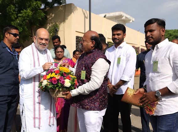 Pyarelal Gundecha felicitating honorable official — Indian cinema industry leader
